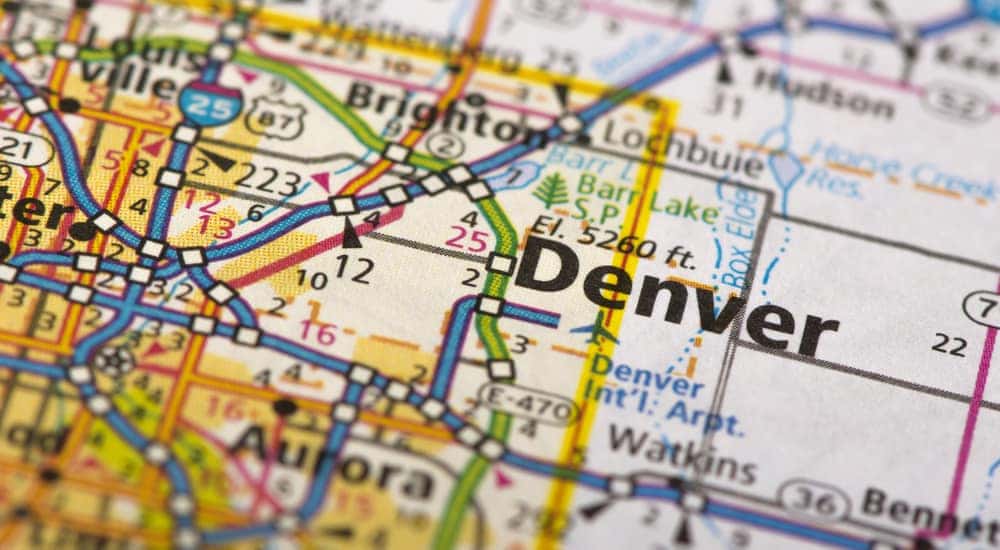 A traditional road map with color-coded highways, zoomed in on the Denver area