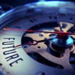 Close-up of the gears on a clock that has the word "future" on it