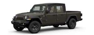 A dark green 2020 Jeep Gladiator is facing left.