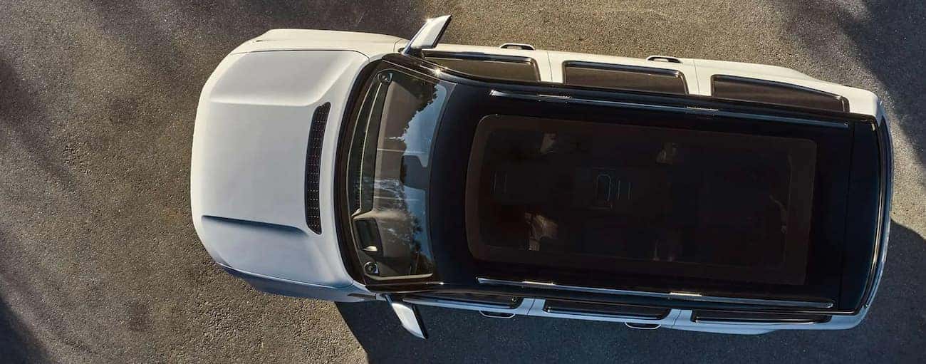 A white 2022 Wagoneer is shown from above on pavement.