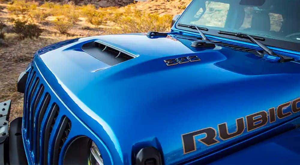 A close up shows the hood and badging on a 2021 Jeep Wrangler Rubicon 392.
