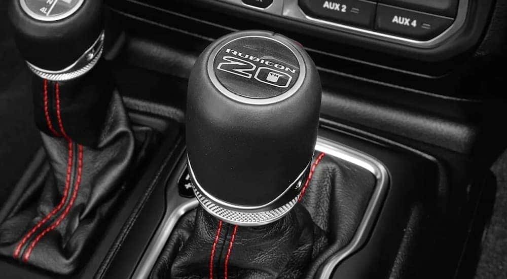 The shifter in a 2023 Jeep Wrangler Rubicon 20th anniversary edition is shown.