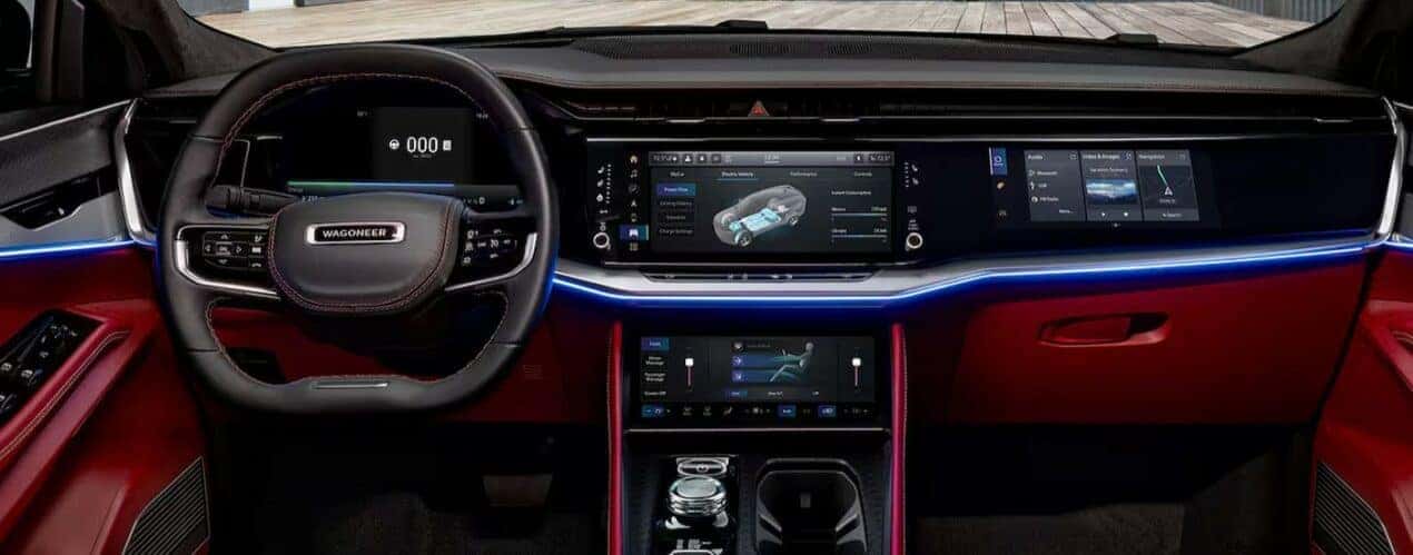 The black and red interior and dash in a 2024 Jeep Wagoneer S is shown.