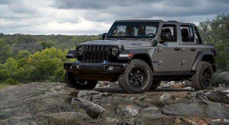 A gray 2022 Jeep Wrangler Willys is shown parked off-road after viewing used Jeeps for sale near Calhan.