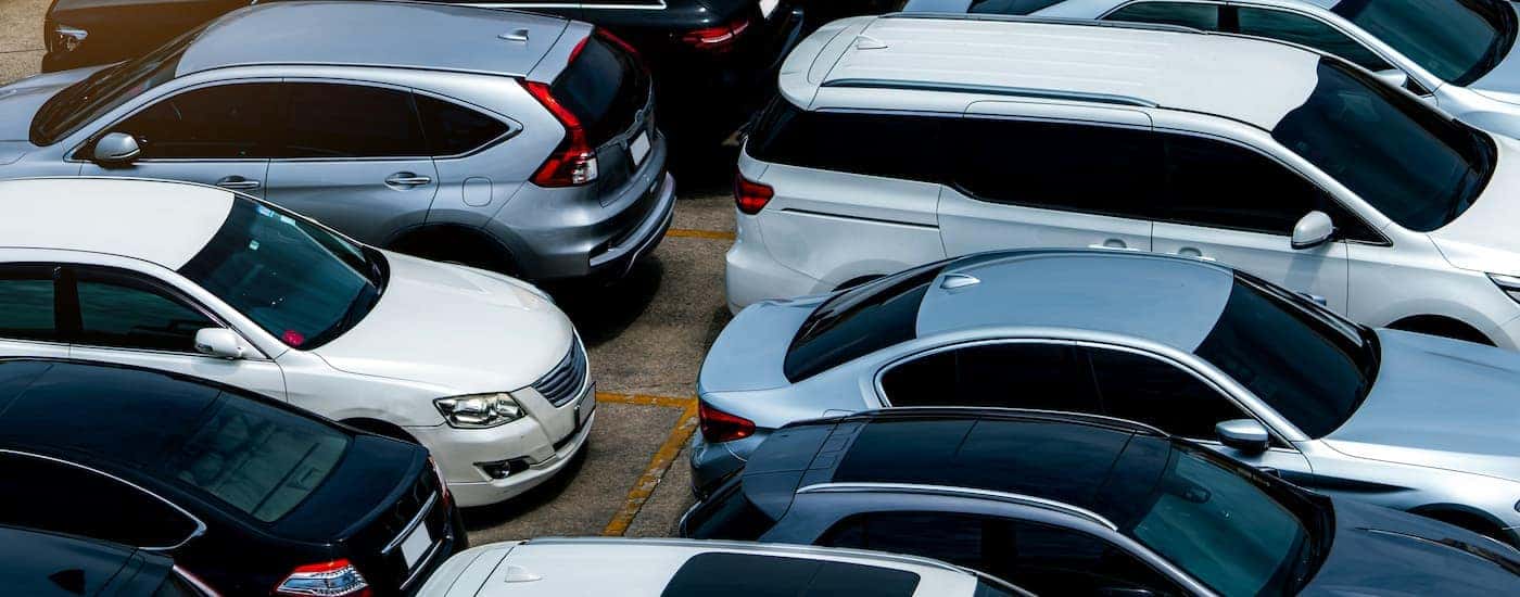 Row of vehicles at a used car dealer near you.