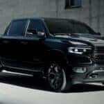 A black 2022 Ram 1500 after leaving a used car dealer near me.