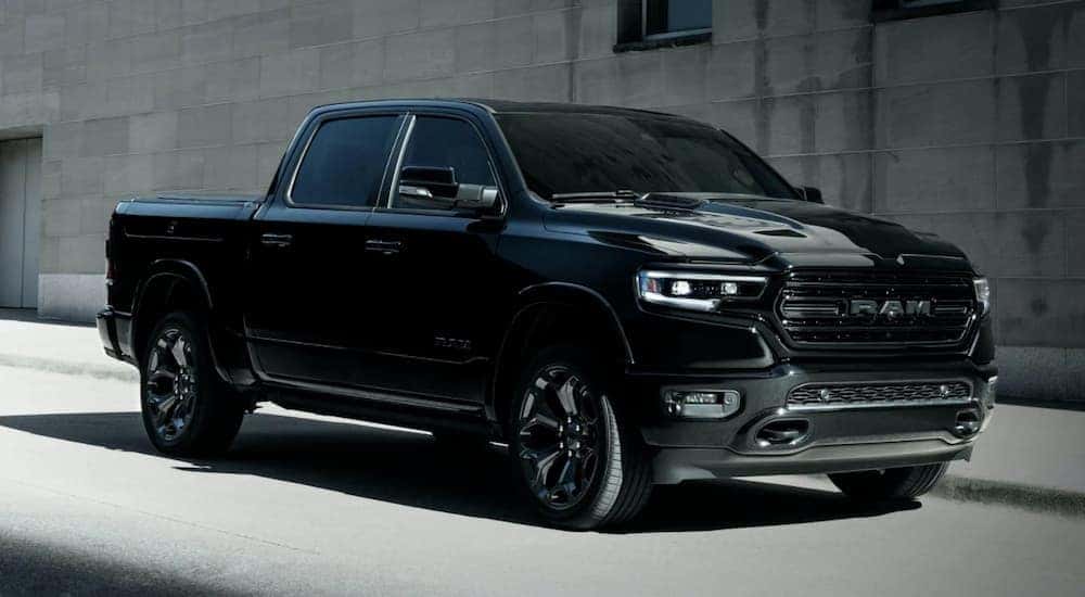 A black 2022 Ram 1500 after leaving a used car dealer near me.
