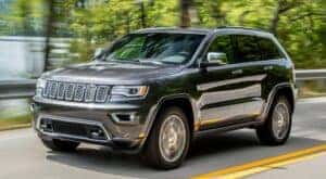 A grey 2020 Jeep Grand Cherokee from the front.