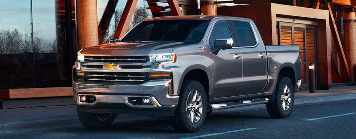 Grey 2019 Chevy Silverado 1500 Z71 parked outside a building.