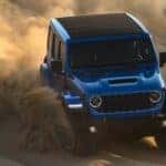 A blue 2025 Jeep Wrangler Rubicon 392 from the front.