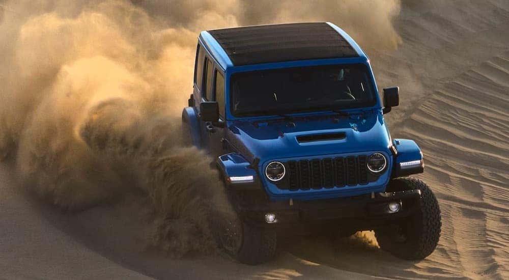 A blue 2025 Jeep Wrangler Rubicon 392 from the front.