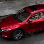 2019 red cx-5 on city street