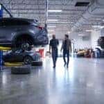 Customers at a Mazda service bay