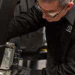 Mazda service tech working on brakes
