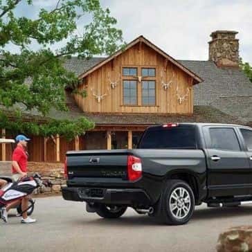 Guys loading golf bags into 2017 Toyota Tundra