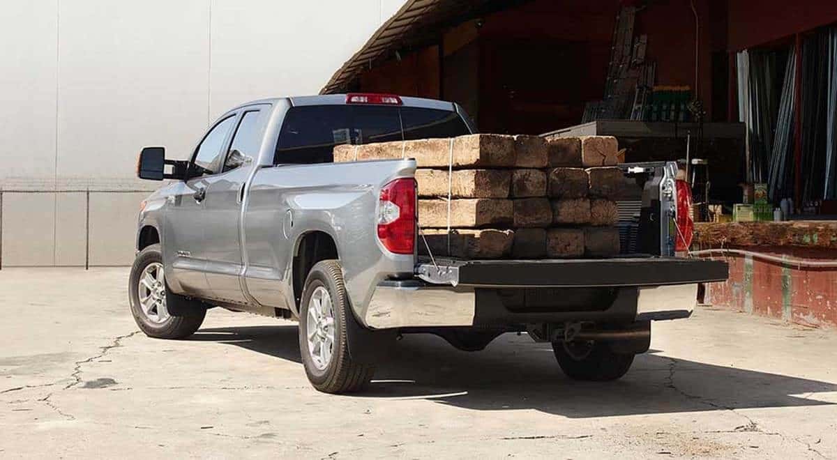 2017 Toyota Tundra bed loaded with wood