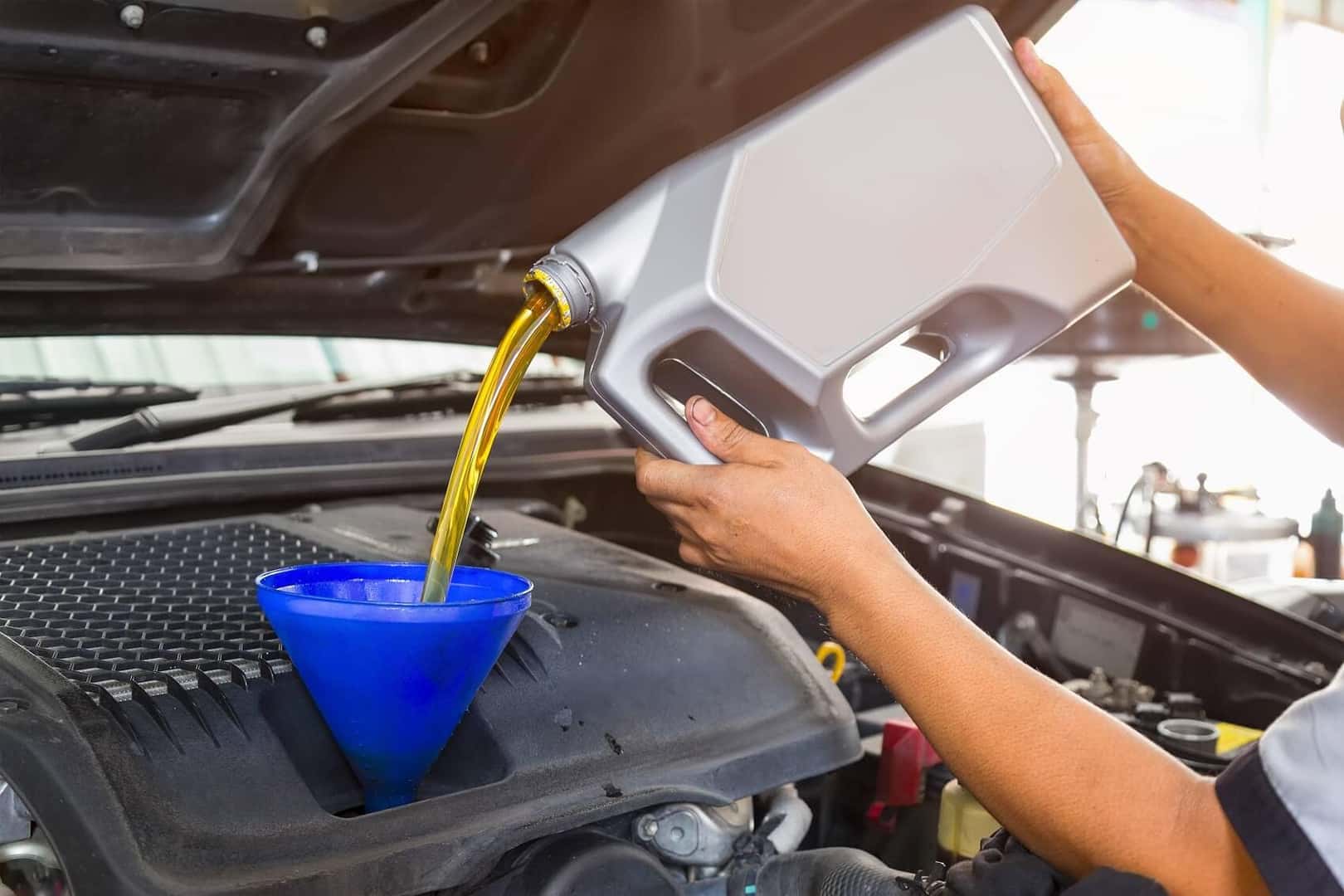 Pouring in New Engine Oil