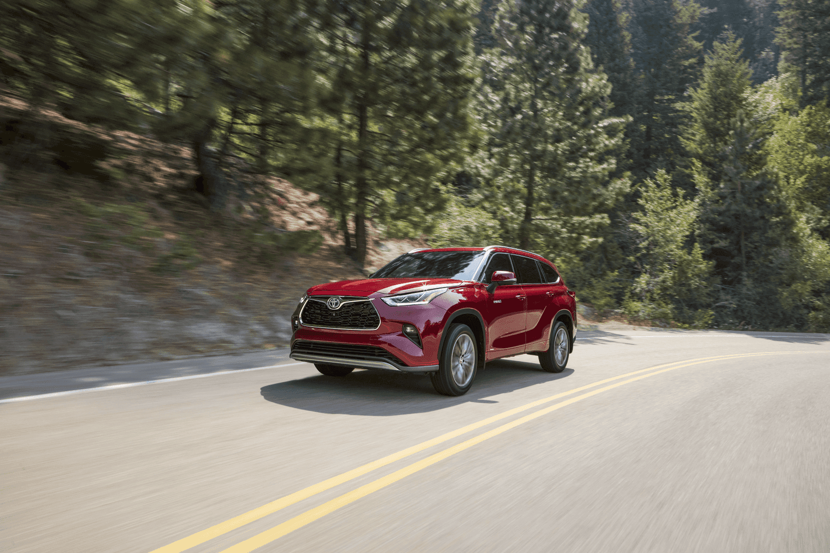 2021 Toyota Highlander Hybrid Red Highway