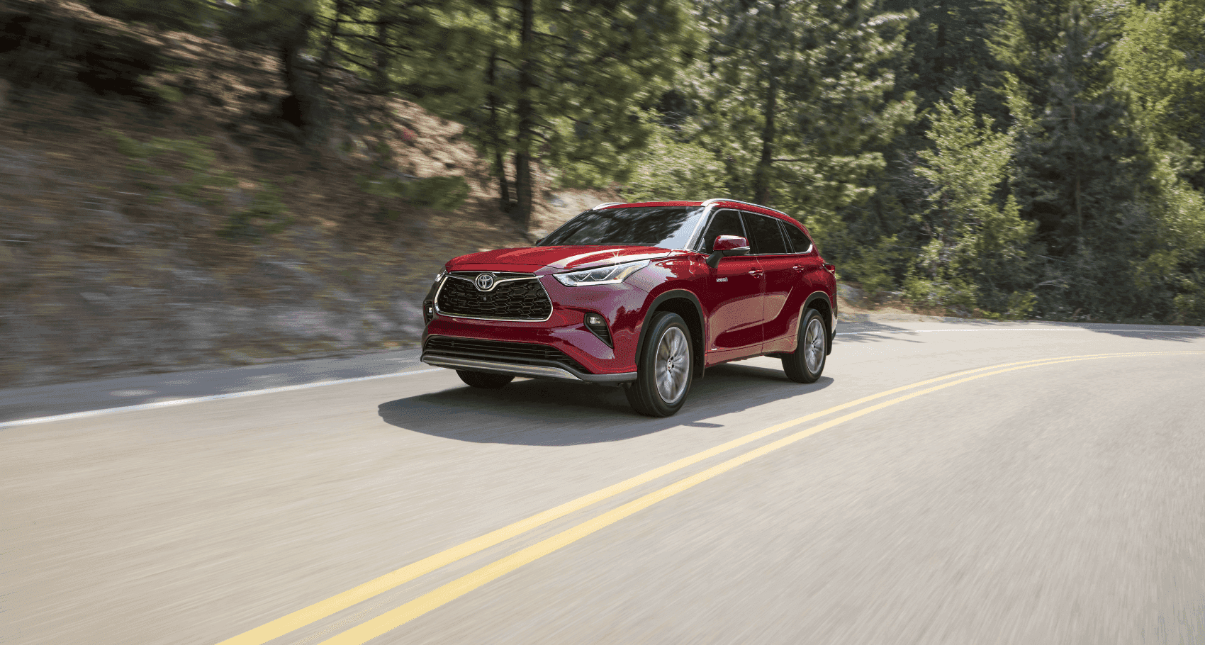 2021 Toyota Highlander Hybrid Red Highway